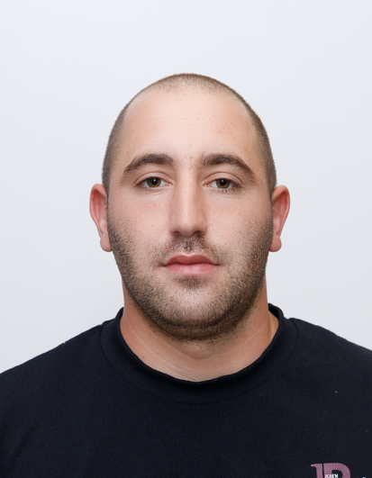 Georgi Findrin, General Manager at Pirin Transfers – smiling office portrait